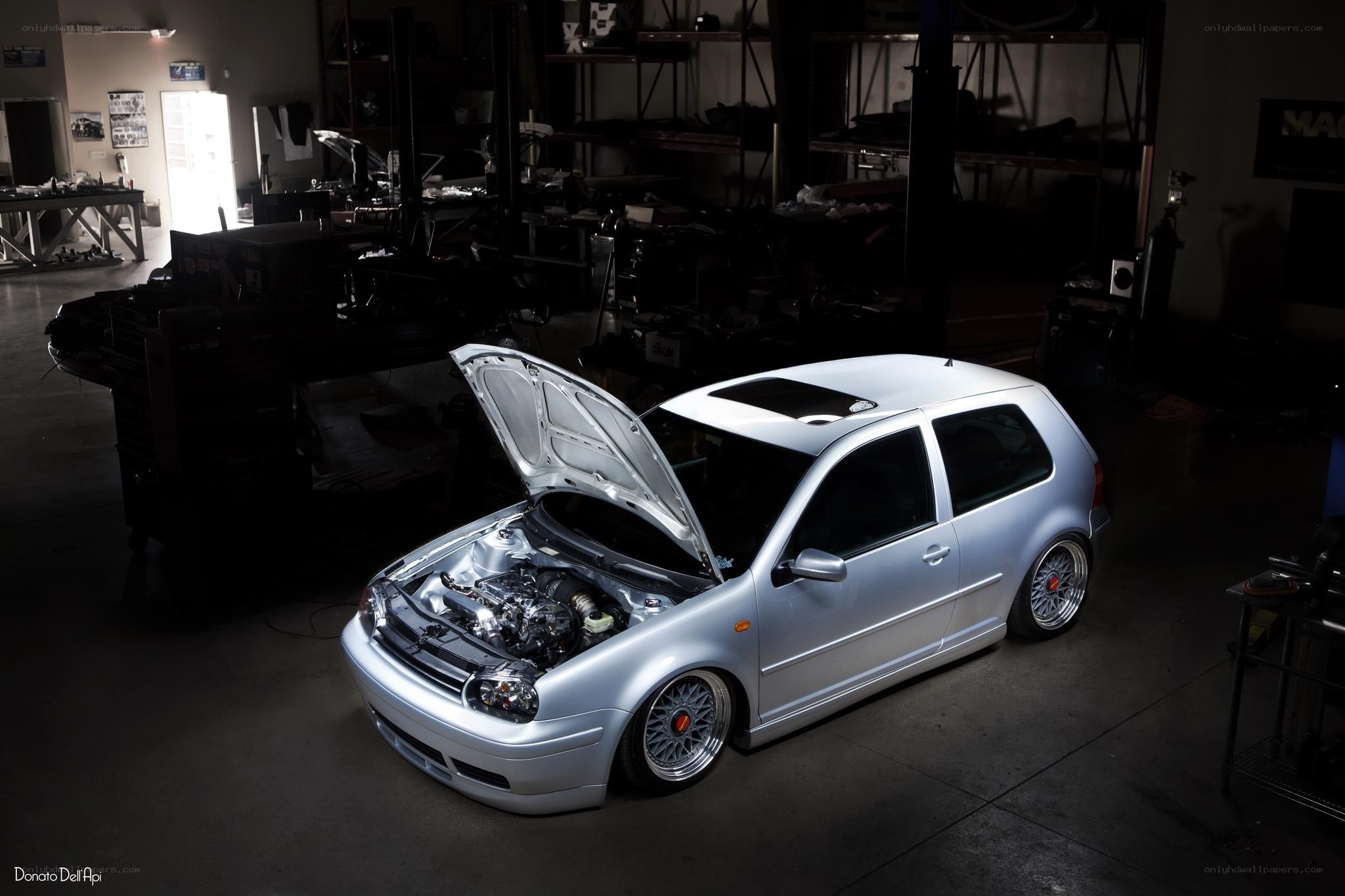 Silver car in garage workshop