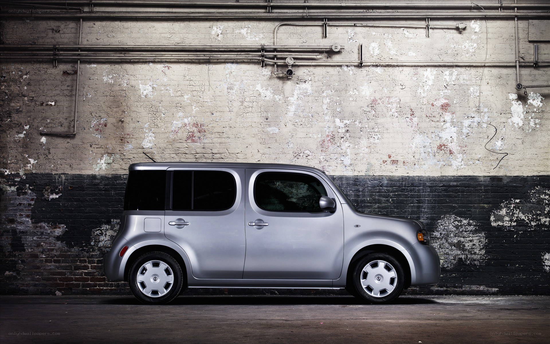 Silver car in industrial setting