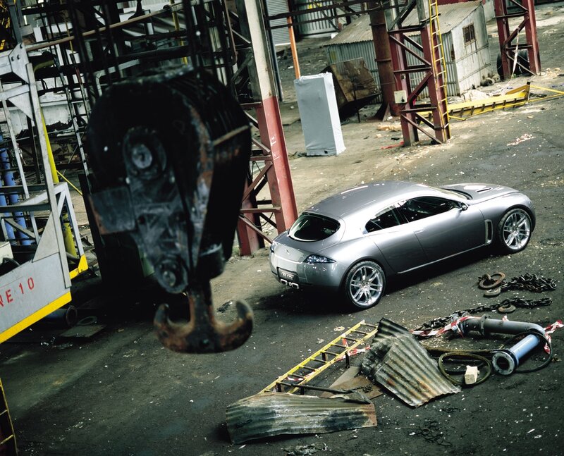 Silver car in industrial setting