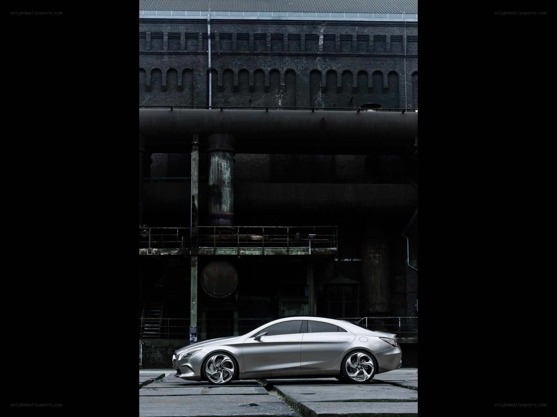 Silver car in industrial setting