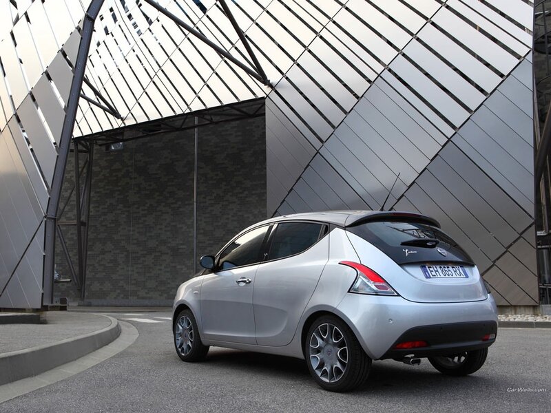 silver car in modern architecture