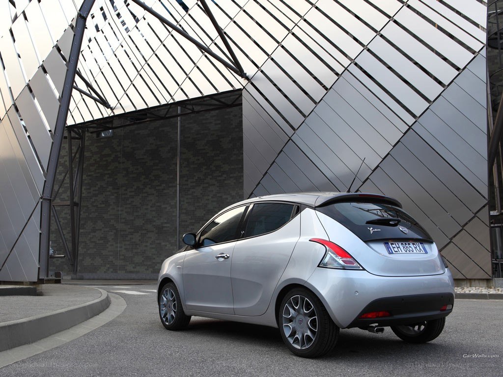 silver car in modern architecture