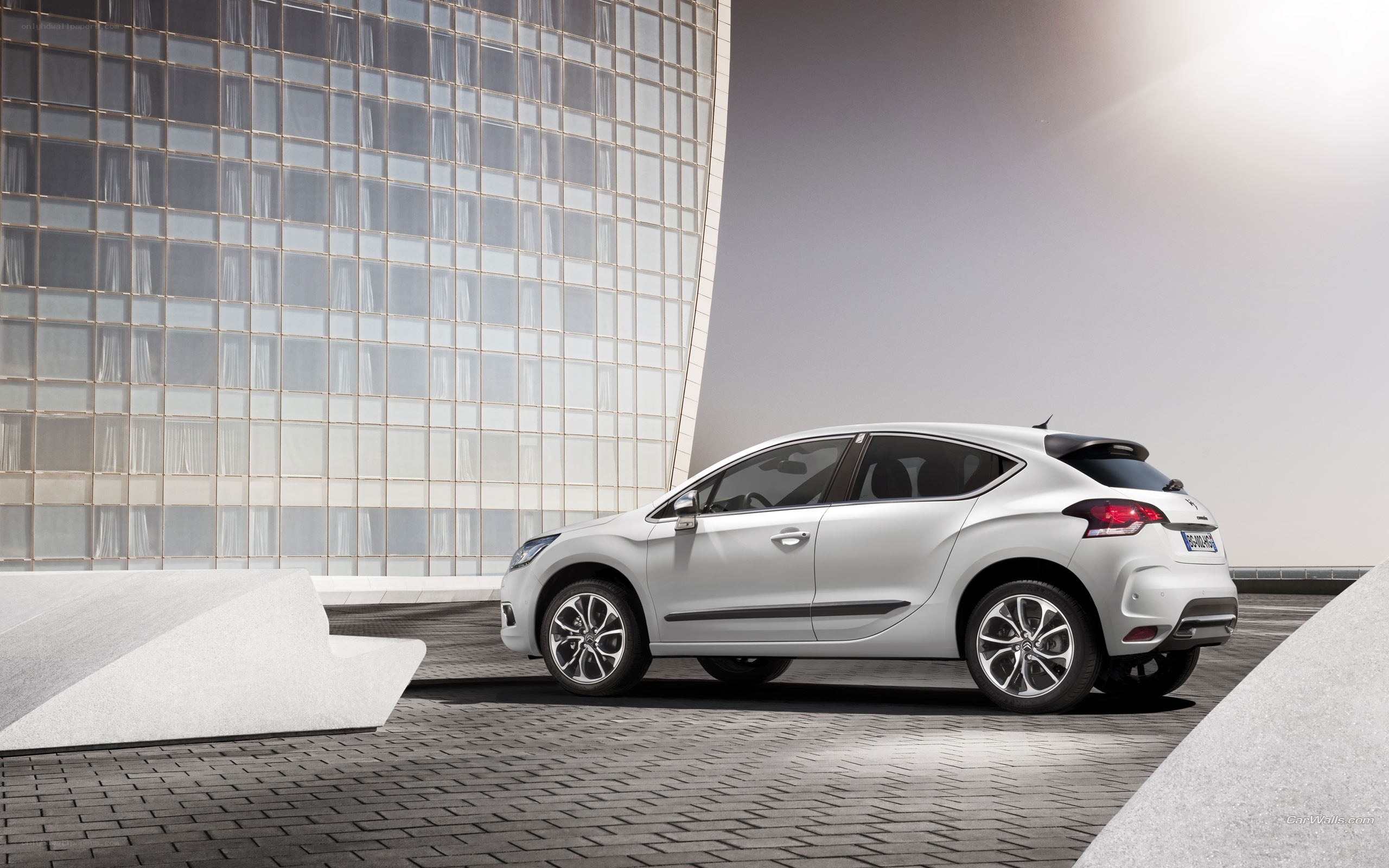 silver car in modern setting
