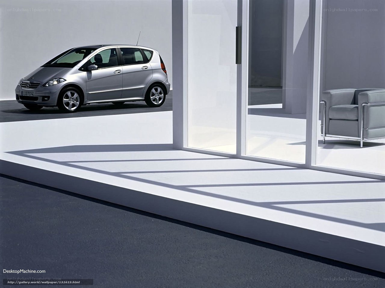 Silver car in modern setting