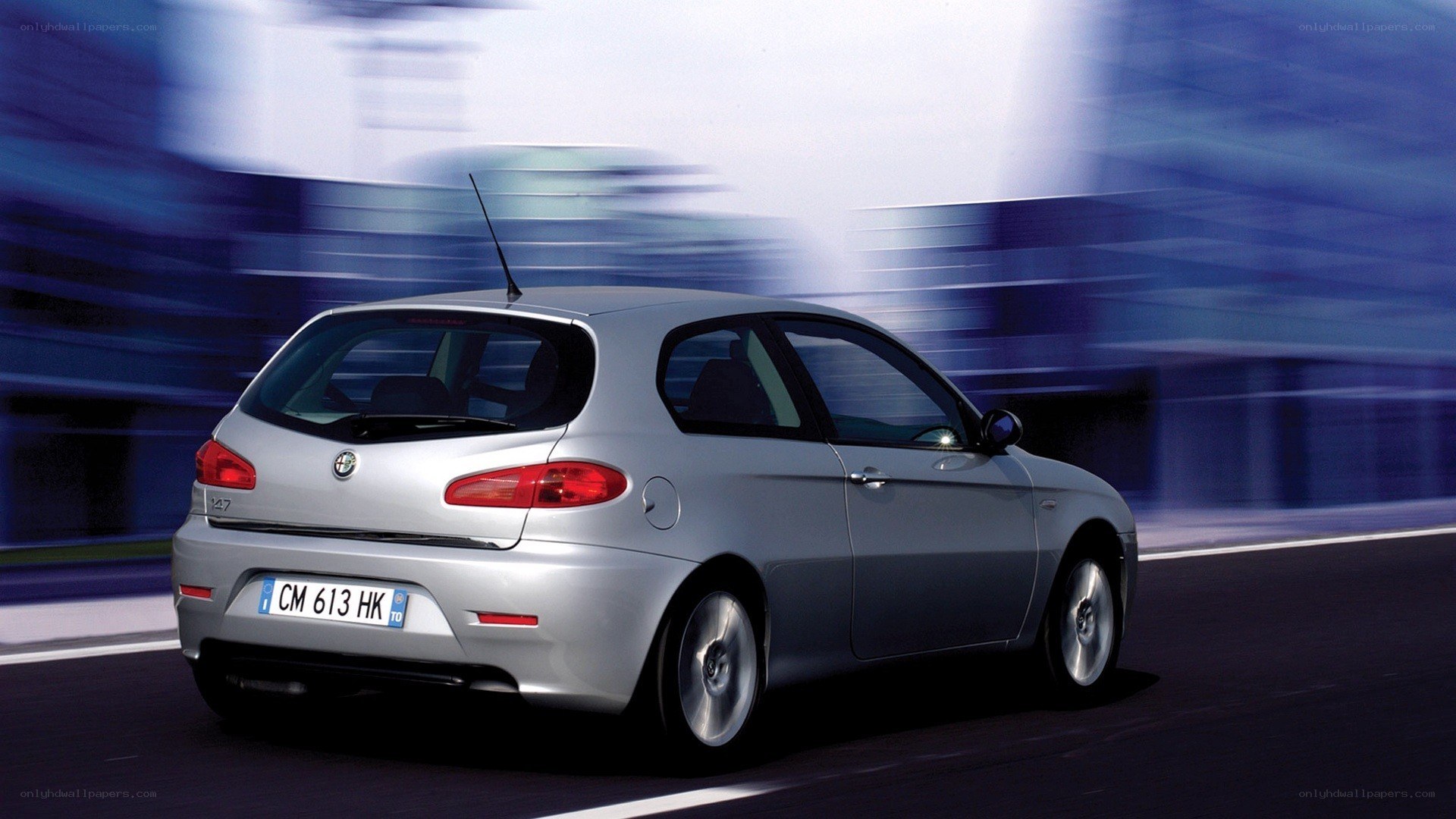 silver car in motion