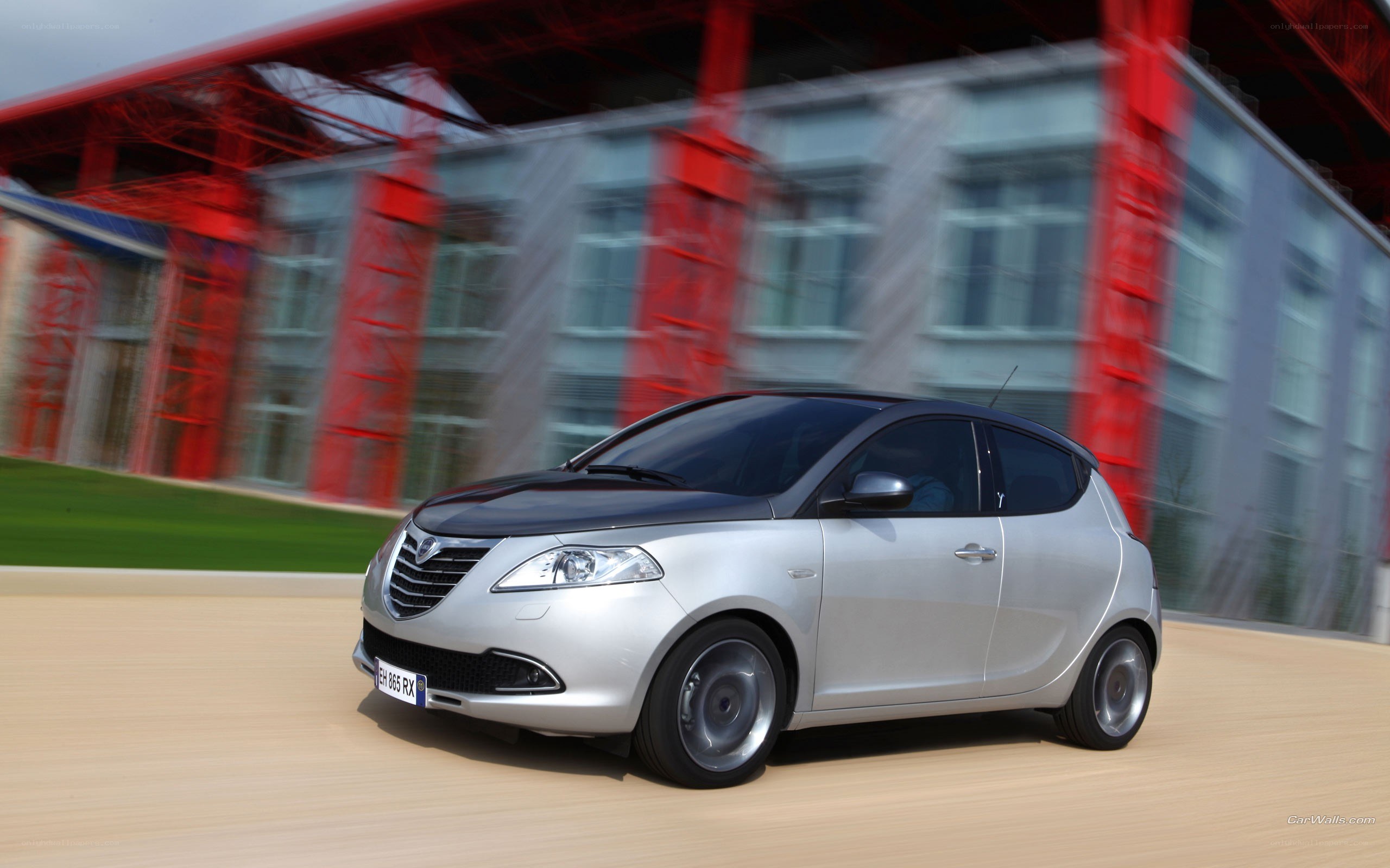 silver car in motion