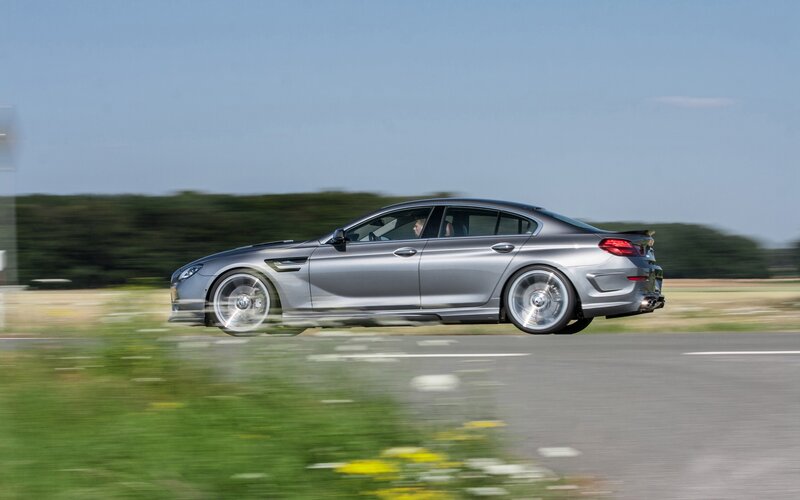 silver car in motion