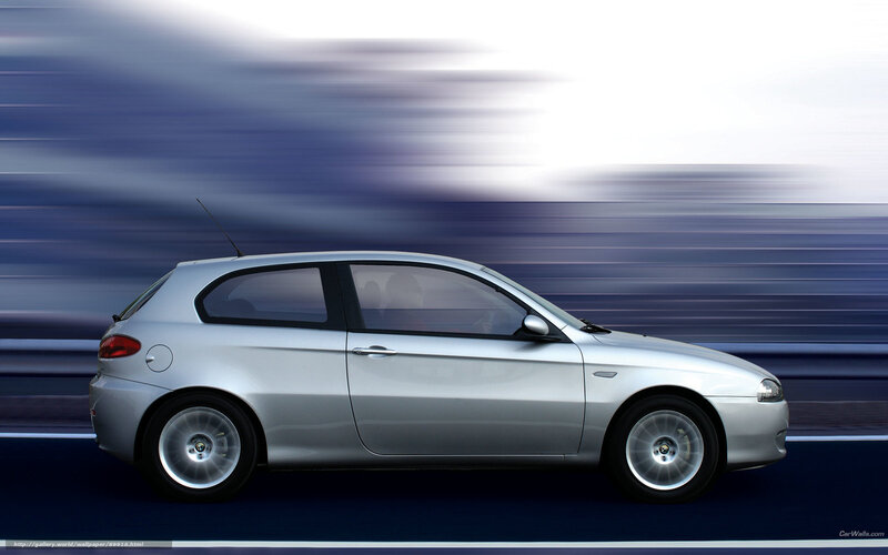 silver car in motion