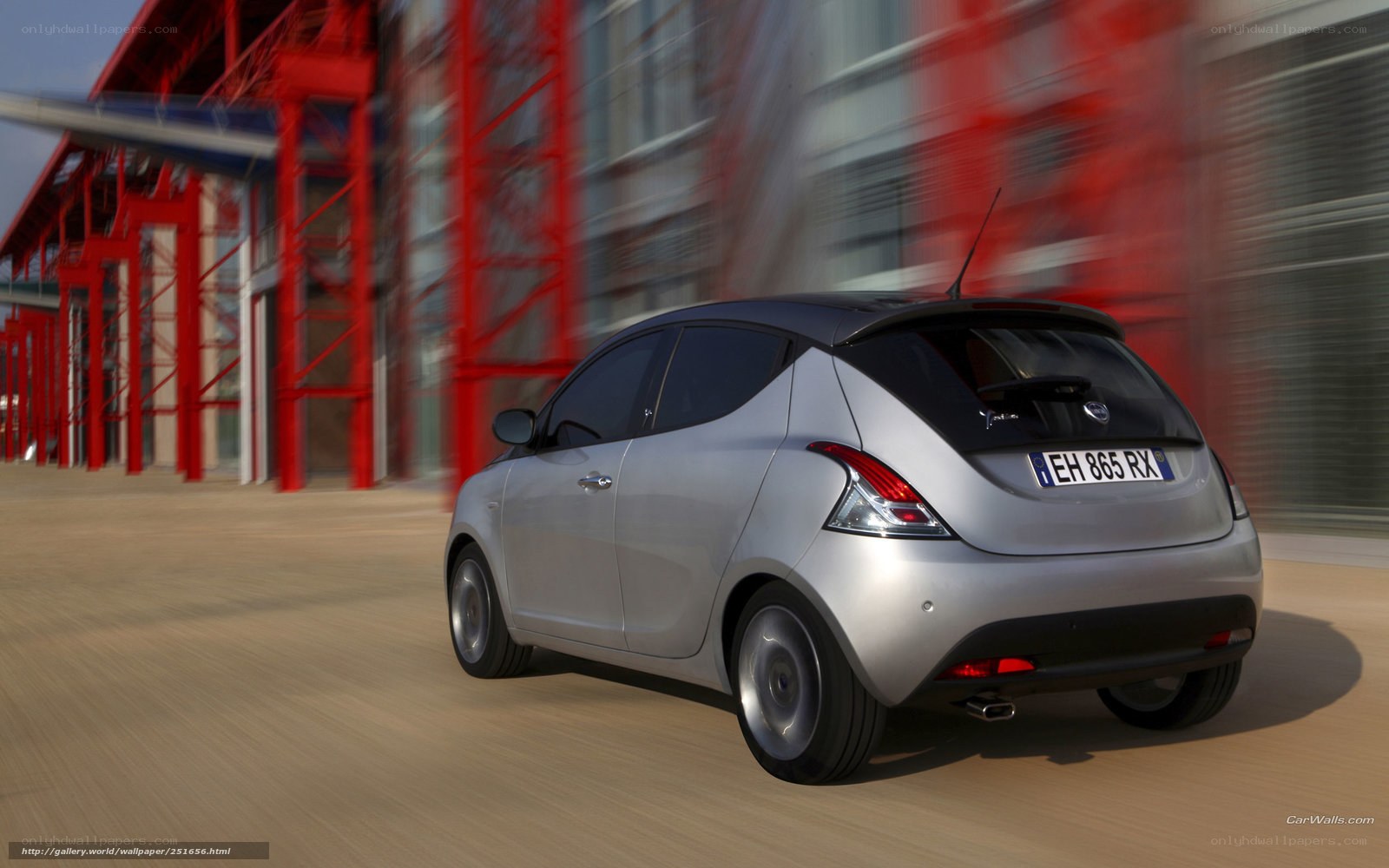 silver car in motion
