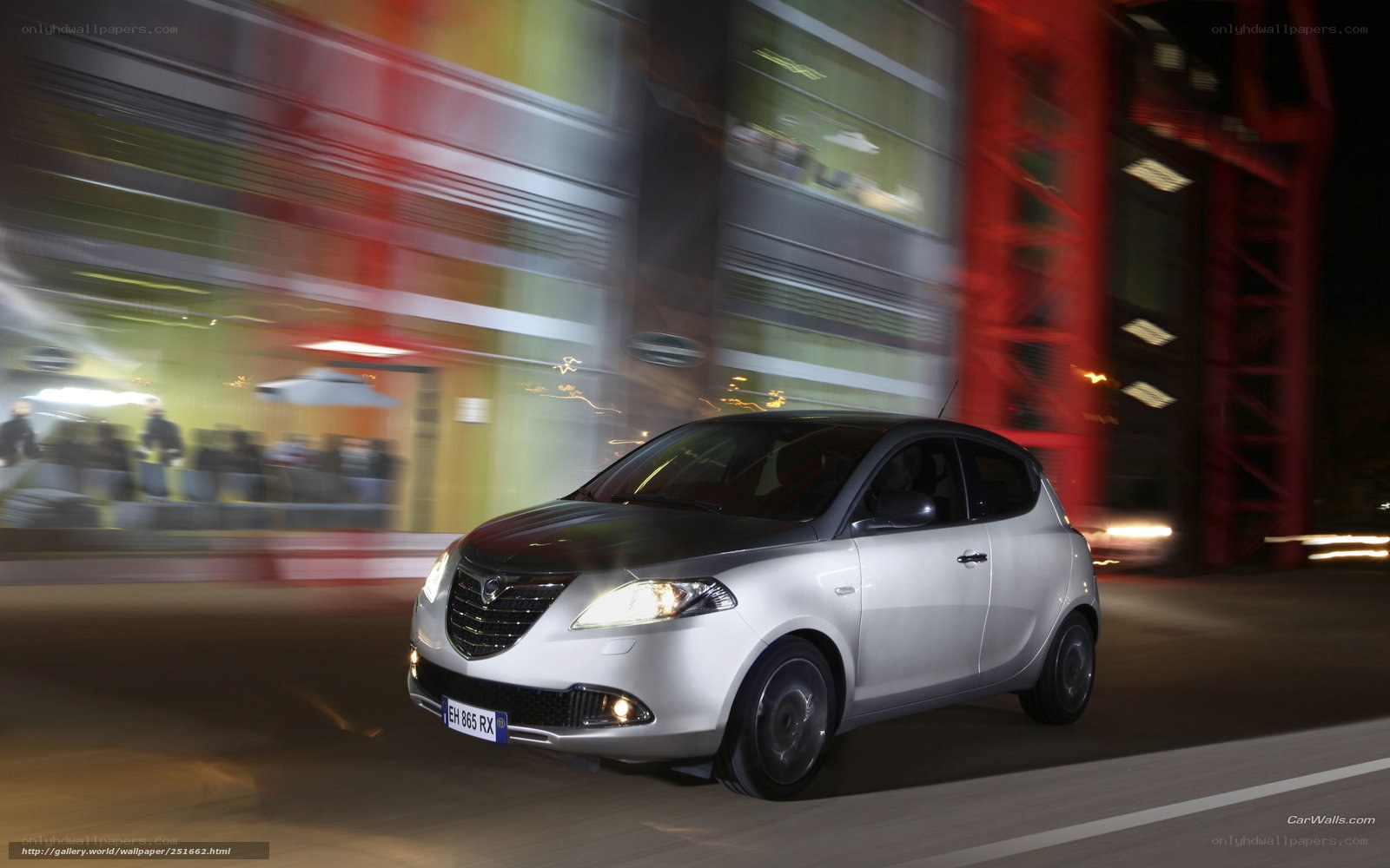 silver car in motion at night