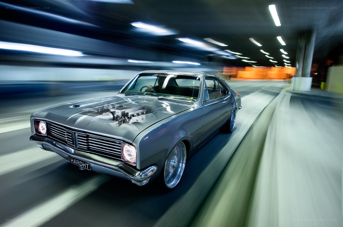 Silver car in motion tunnel