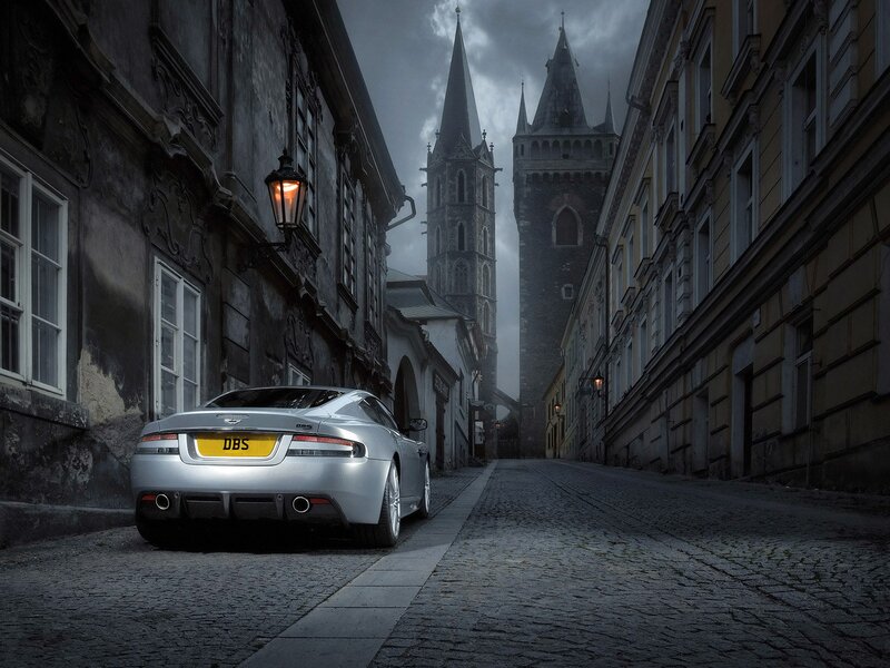 Silver car in old city street