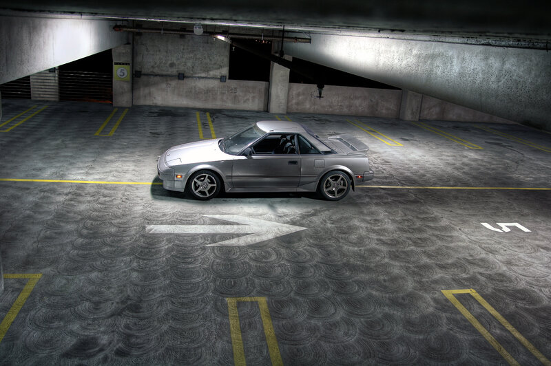 Silver car in parking garage