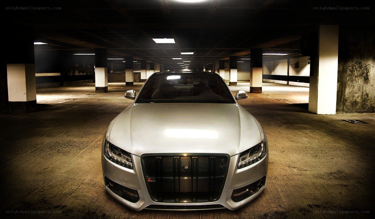 silver car in parking garage