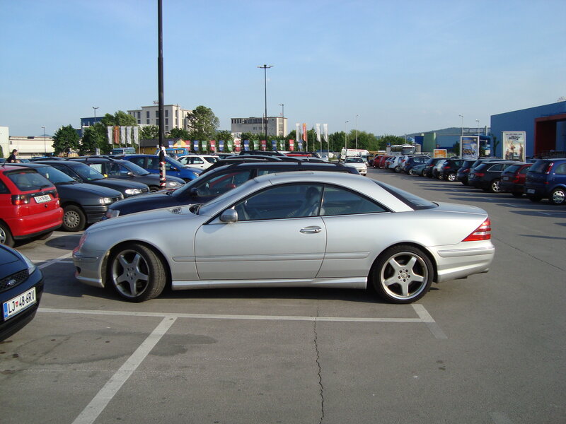 Silver car in parking lot