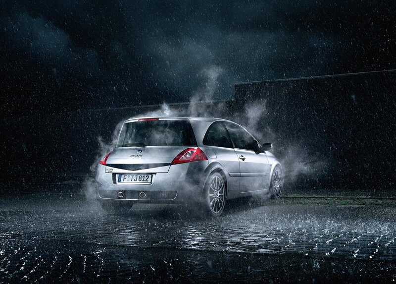 Silver car in rainy night