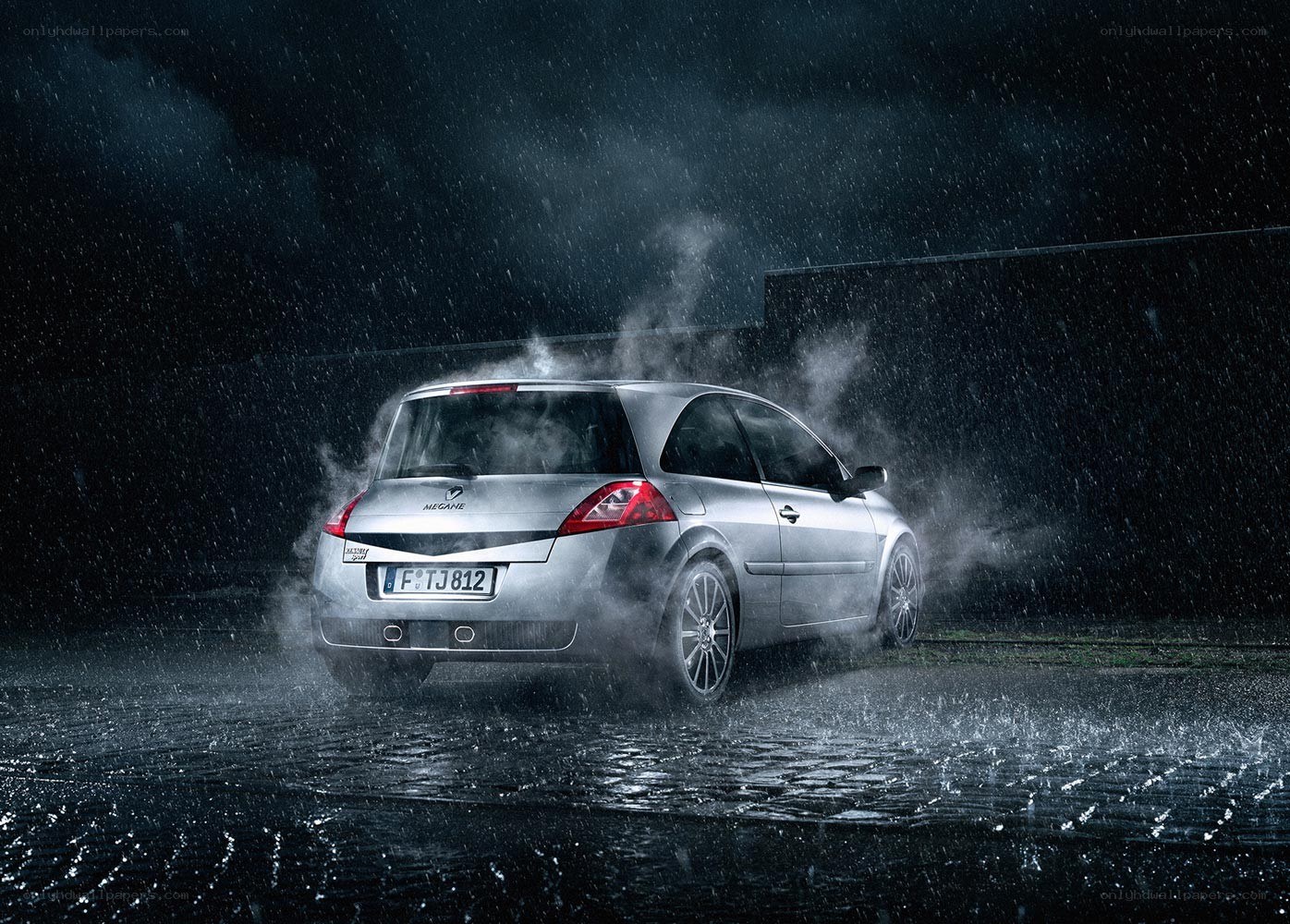 Silver car in rainy night