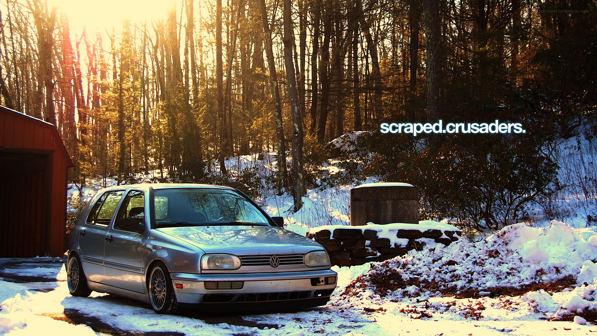 Silver car in snowy woods