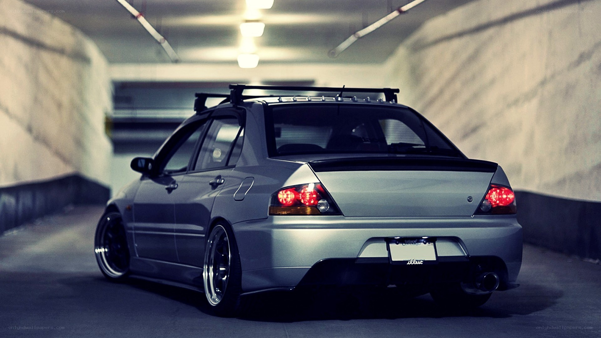 silver car in tunnel