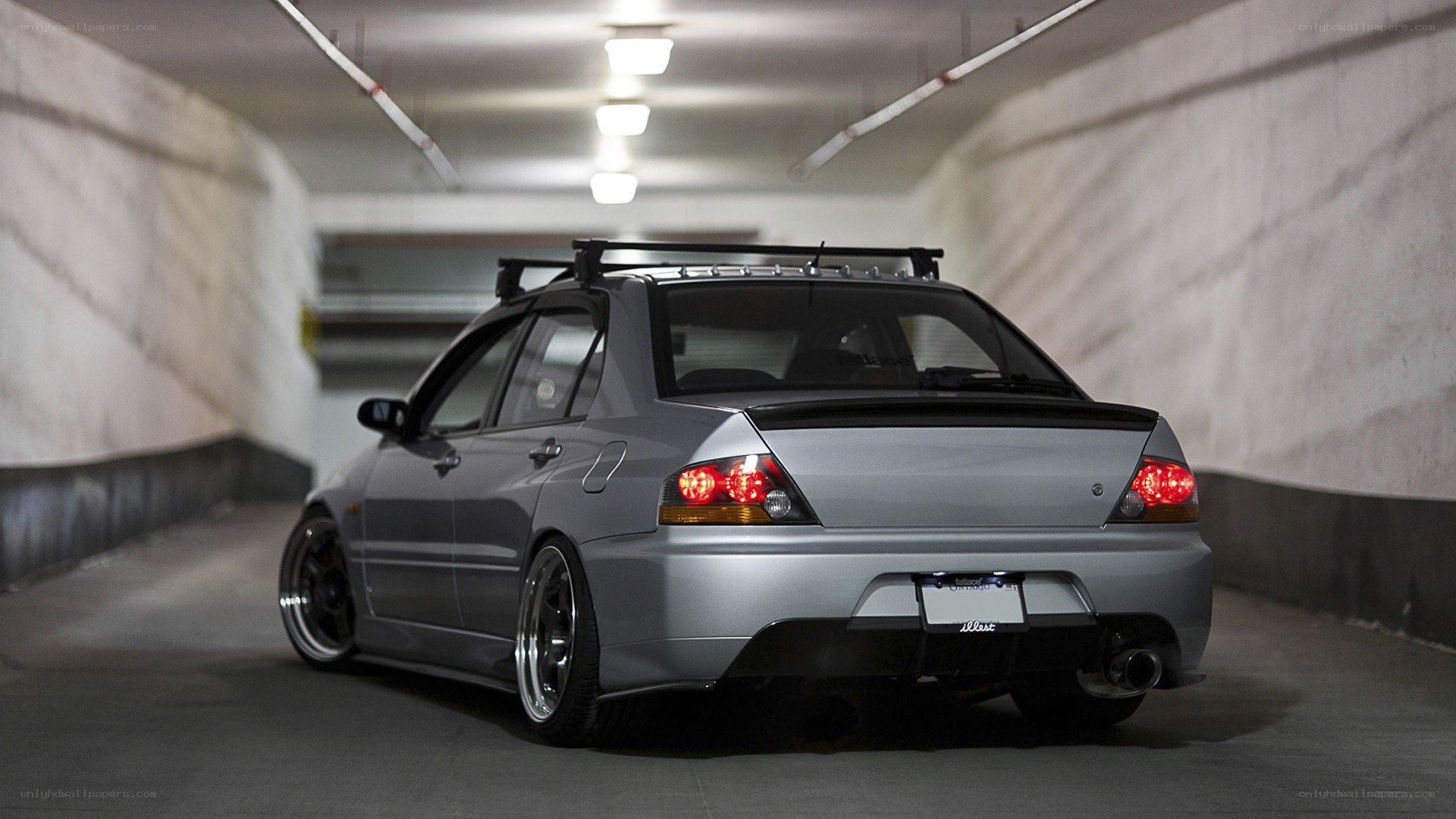 silver car in underground tunnel