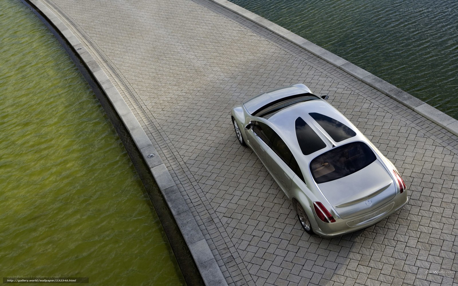Silver car on a bridge