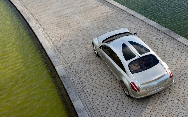 Silver car on a bridge