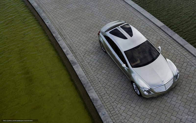 Silver car on a bridge