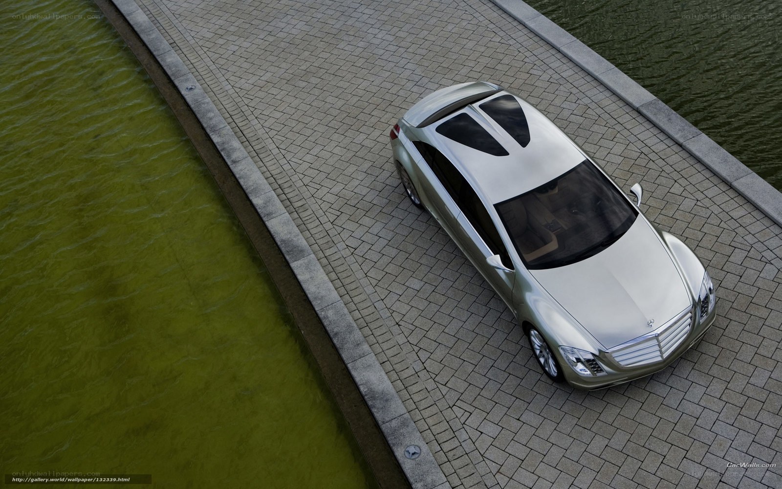 Silver car on a bridge