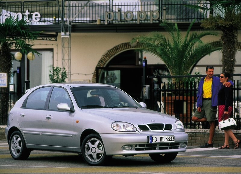 Silver car on a city street