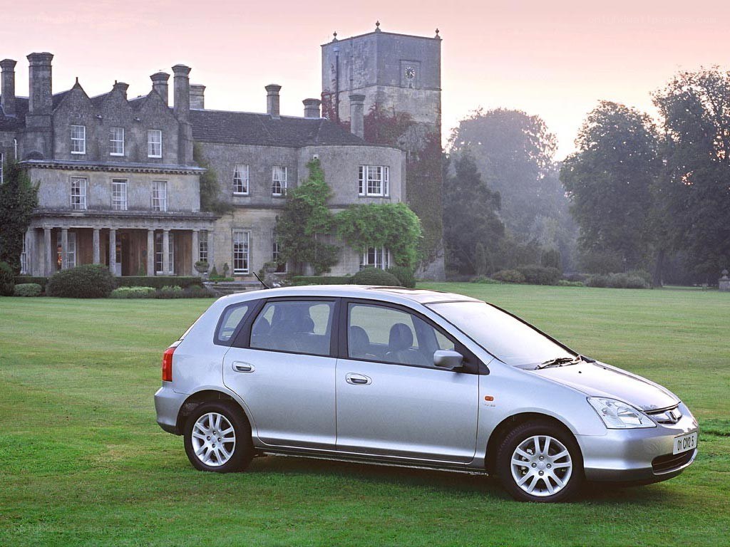 Silver car on a lawn
