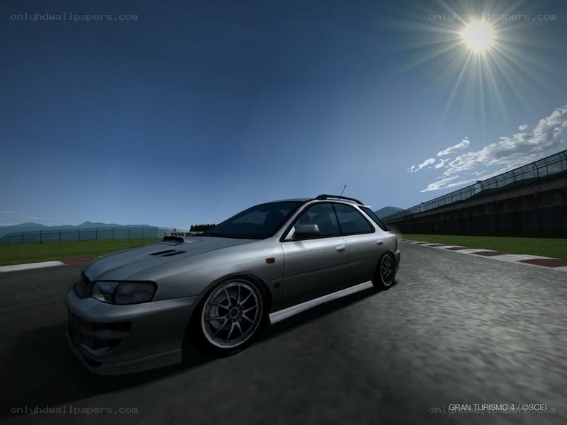 Silver car on a racetrack