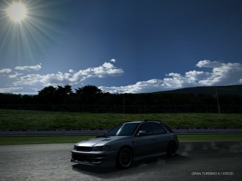 Silver car on a racetrack
