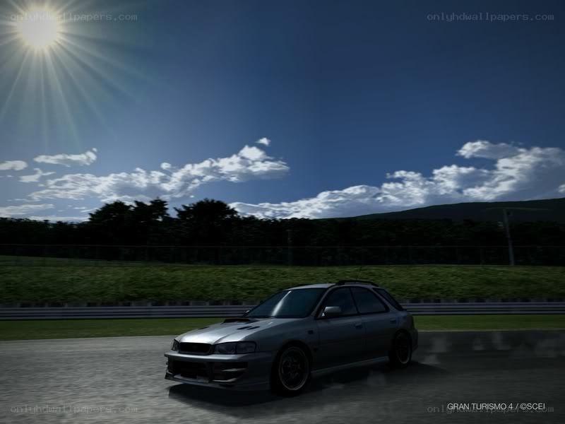 Silver car on a racetrack