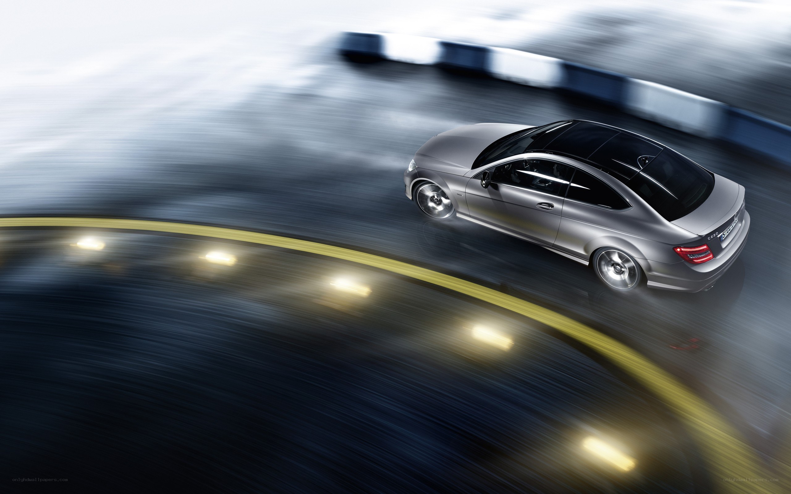 Silver car on a racetrack