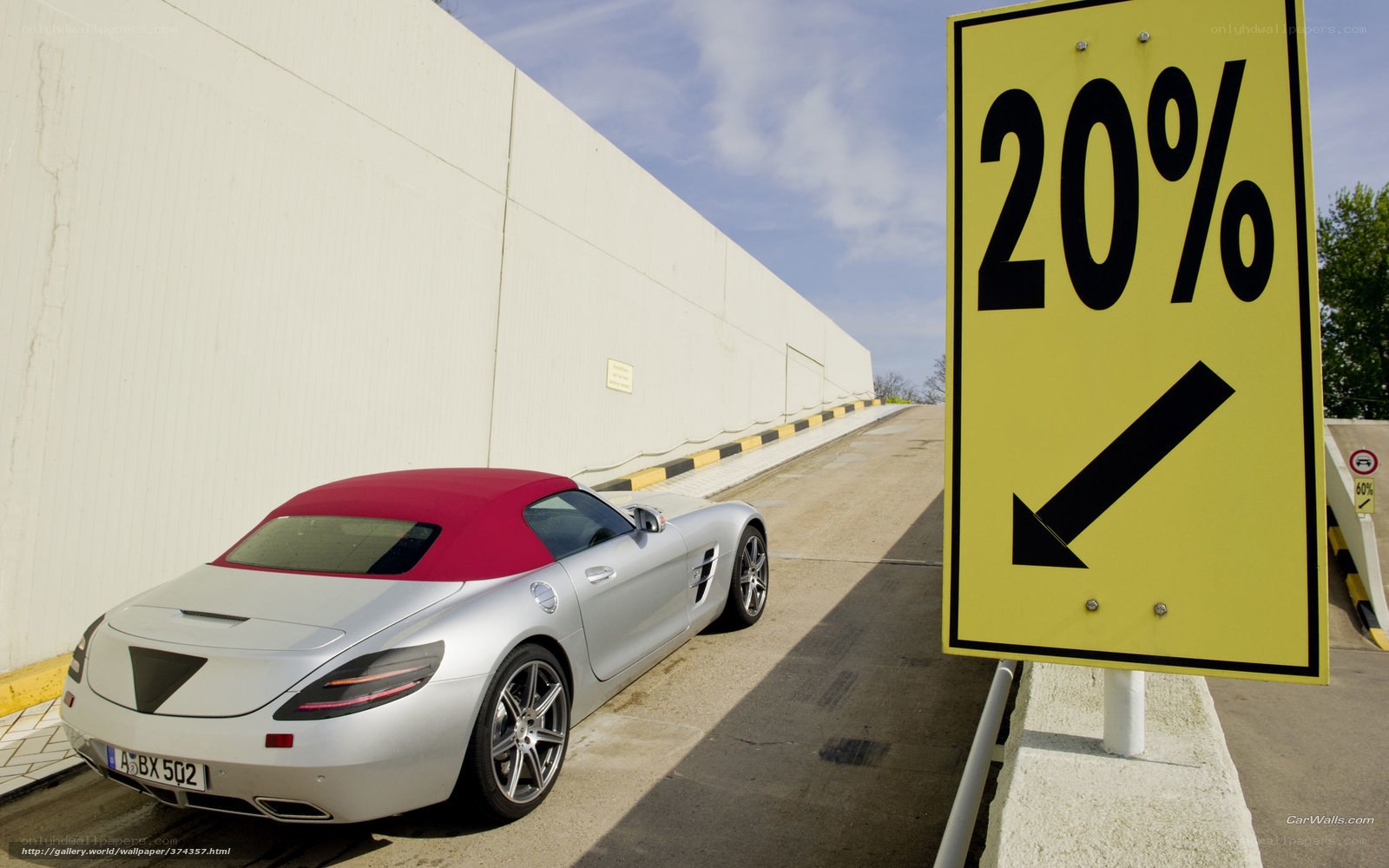 Silver car on a steep incline