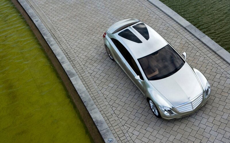 Silver car on a stone path
