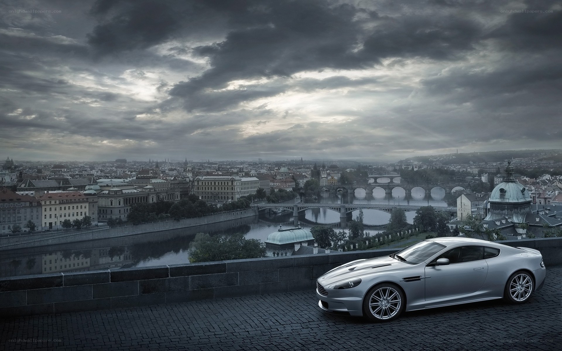 Silver car on city overlook