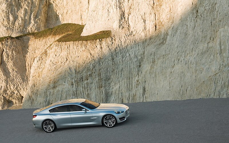 Silver car on cliffside