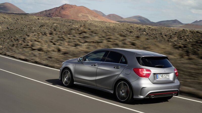 silver car on desert road