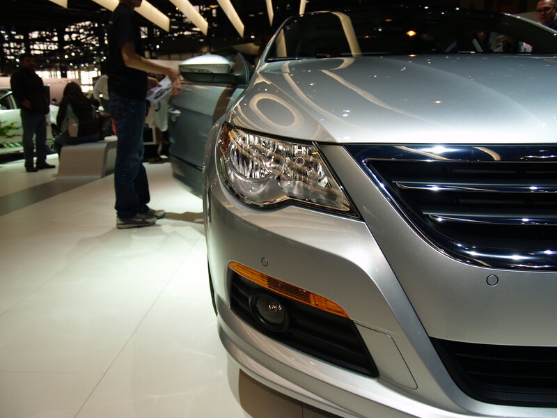 Silver car on display at auto show