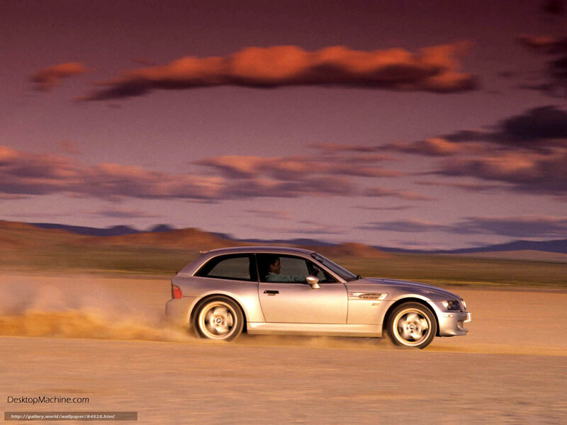 silver car on dusty road