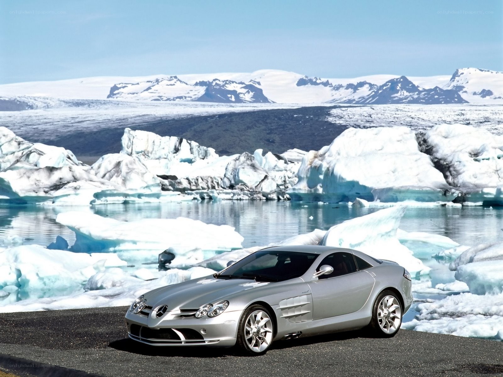 Silver car on glacier ice
