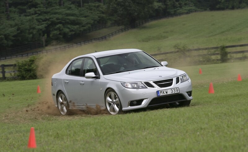 Silver car on grass course