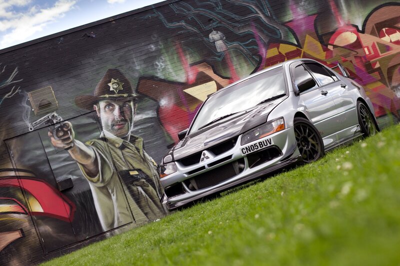 Silver Car on Grass