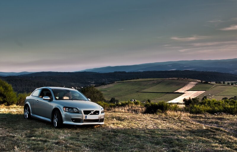 Silver Car on Hillside