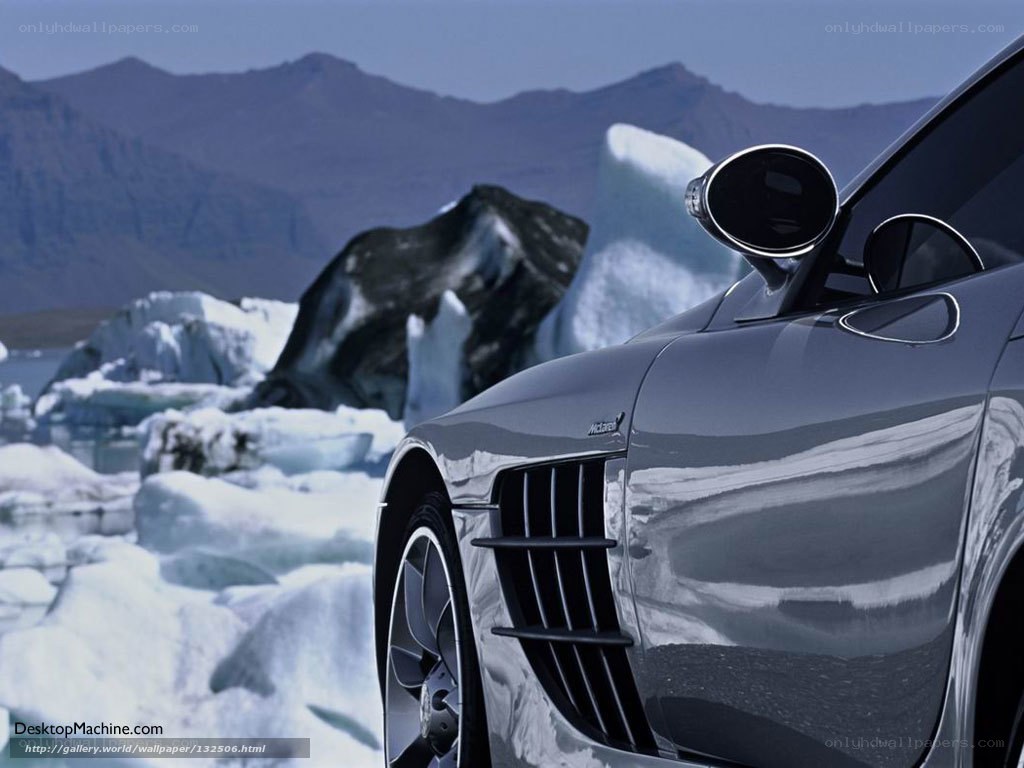 Silver car on icy landscape