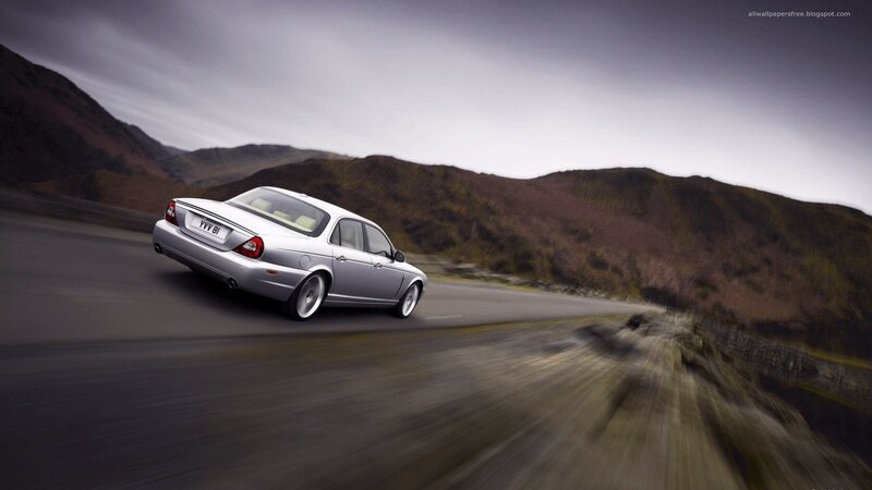 silver car on mountain road