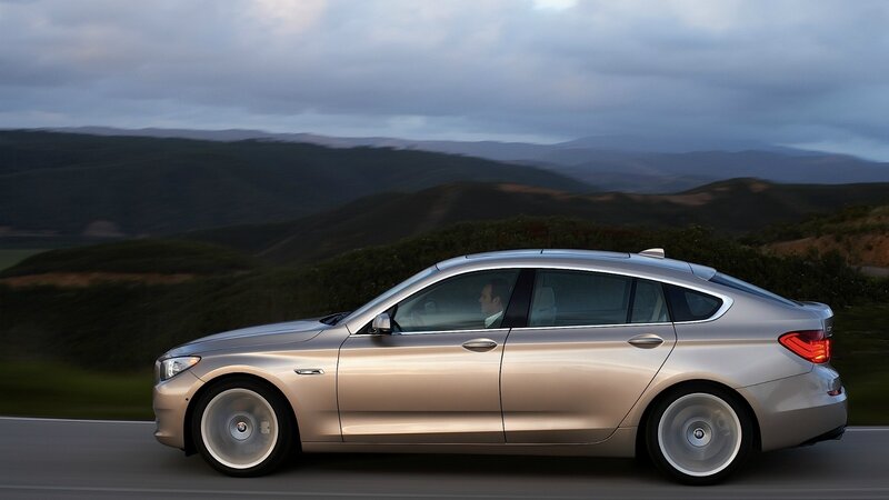 silver car on mountain road