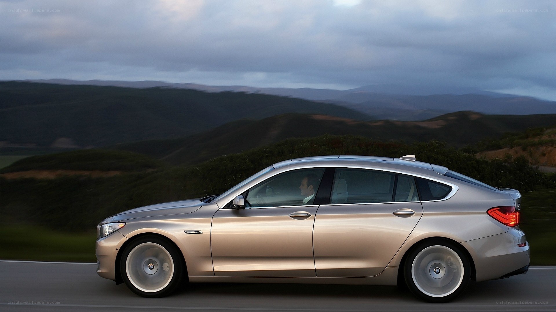 silver car on mountain road