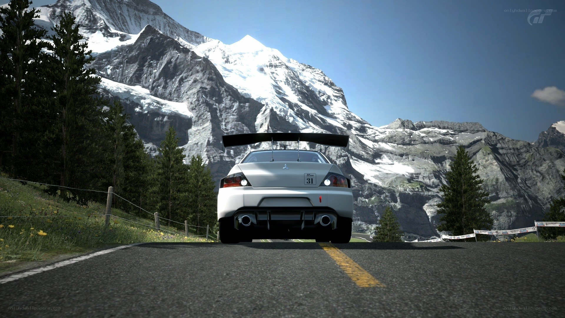Silver car on mountain road